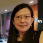 Accounts manager reviewing financial reports to ensure cost-effective vinyl flooring solutions and optimal budgeting.